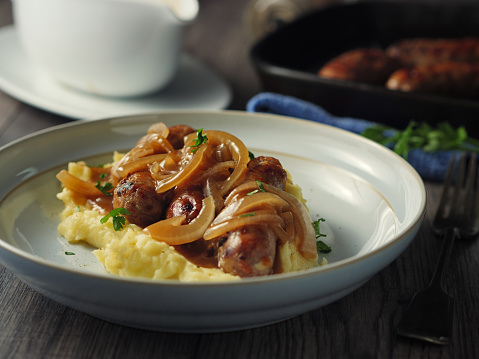 Home made freshness Traditional British Dish,grilled pork sausage with mashed potatoes and onion gravy