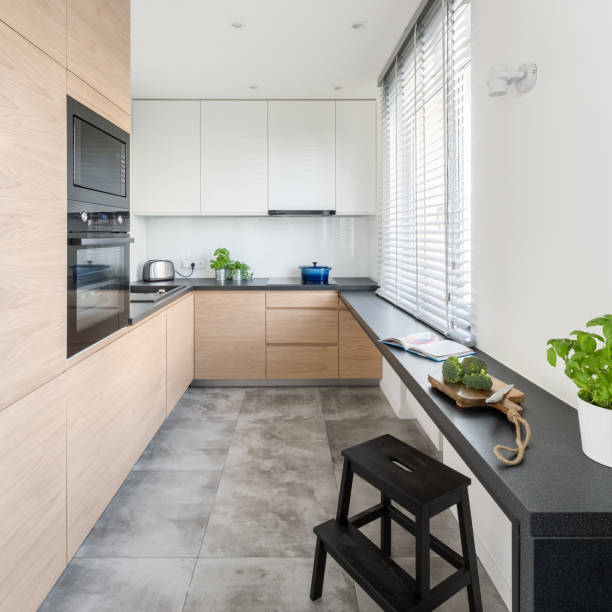 istock Kitchen with wooden furniture 869363874