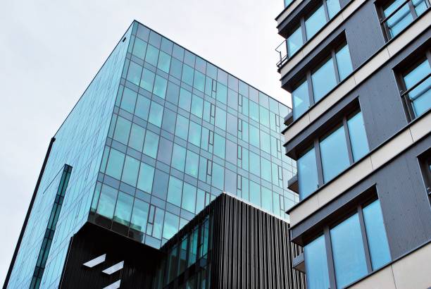 istock Glass windows of office building 869366634