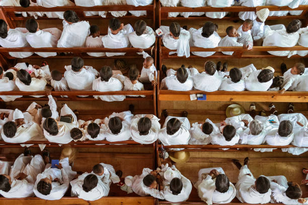 Soatanana, Madagascar, March 05, 2013: Women of the white shepherds of Soatanana in their church. They are a fundamentalist branch of Protestantism very specific in Madagascar. All the inhabitants are dressed in white.