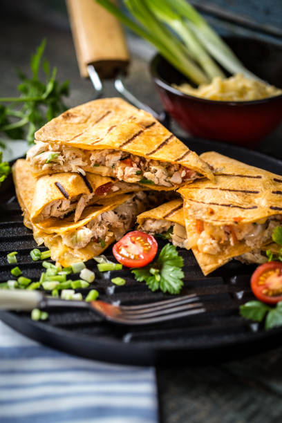 istock Mexican food quesadilla with grilled chicken, salsa and cheese 869367008