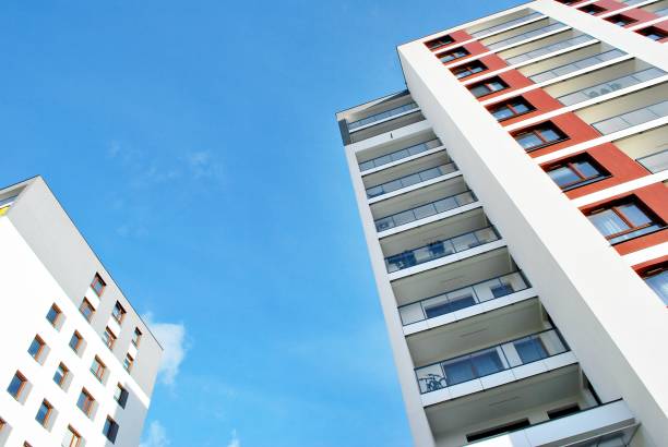 istock Modern, Luxury Apartment Building against blue sky 869367594