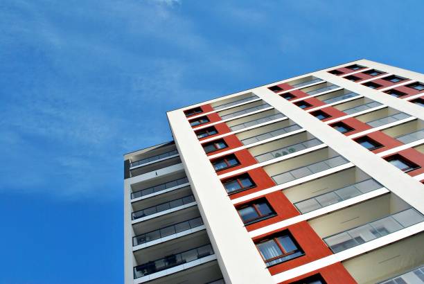 istock Modern, Luxury Apartment Building against blue sky 869367678