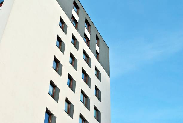 istock Modern, Luxury Apartment Building against blue sky 869368042