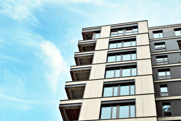 istock Modern, Luxury Apartment Building against blue sky 869368646