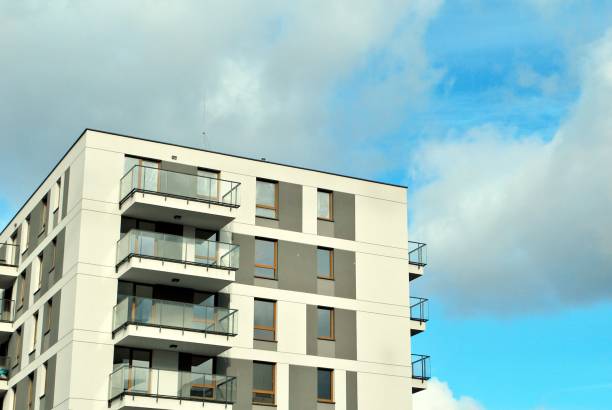 istock Modern, Luxury Apartment Building against blue sky 869375316
