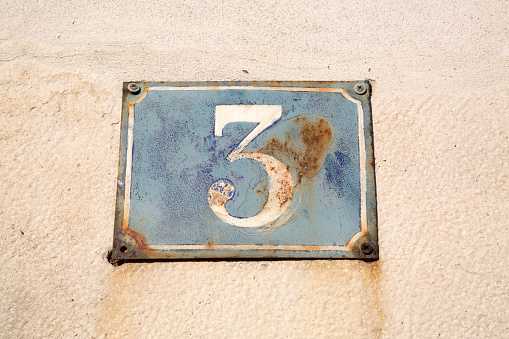 Old Number Three on Wall