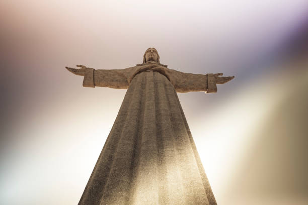 concrete statue of jesus christ in lisbon, portugal.