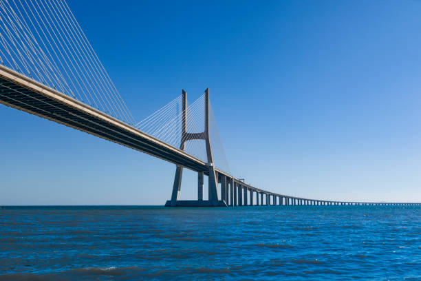 istock vasco da Gama contemporary cable-stayed bridge, lisbon, portugal 869382734