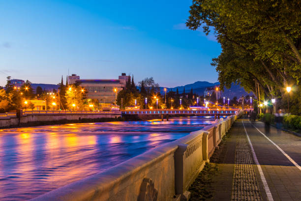 istock Night view of Sochi river and embankment 869385228