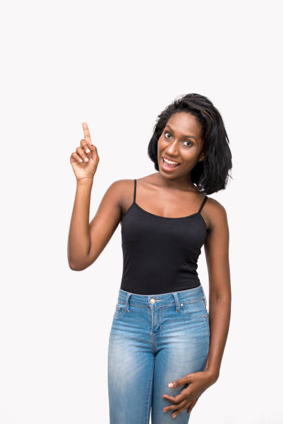 istock Woman pointing upward 869386230