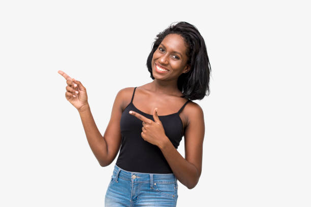istock Woman pointing to left 869387120