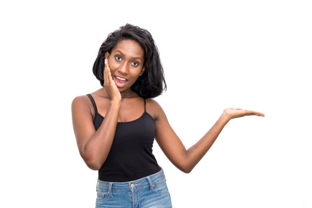 istock Shocked woman showing product 869387878