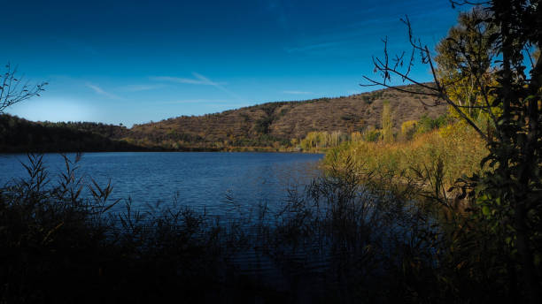 istock Lakeside morning at sunset 869391520