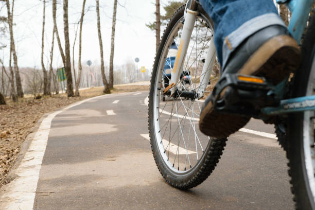 istock Girl on bicycle in Bitsa park, Moscow, Russia 869394874