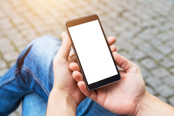 istock Man uses his Mobile Phone outdoor 869397684