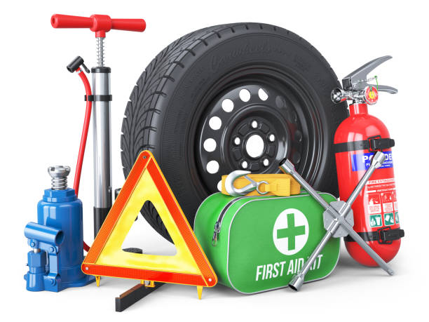 a set of automotive accessories. spare wheel, fire extinguisher, first aid kit, emergency warning triangle, jack, tow rope, wheel wrench, pump. - automotive accessories imagens e fotografias de stock