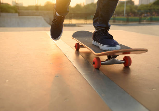 istock skateboarder legs skateboarding on skatepark ramp 869401100