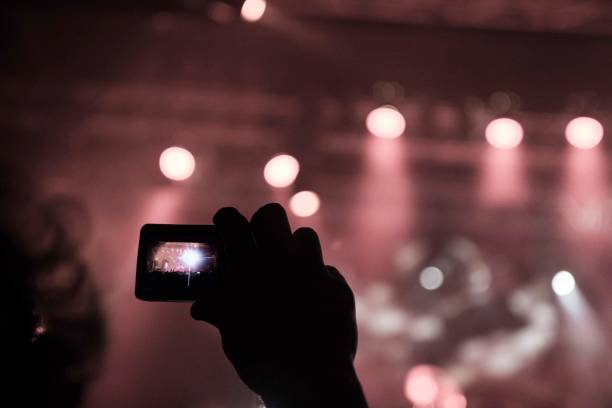 istock Concert crowd in front of a live stage 869402248