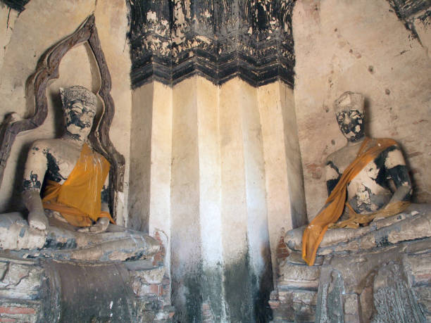 istock Old Buddha in Ayutthaya, Thailand 869403578