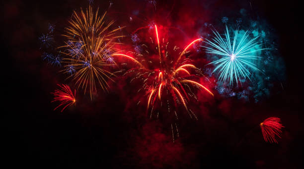 colorato spettacolo pirotecnico - firework display foto e immagini stock