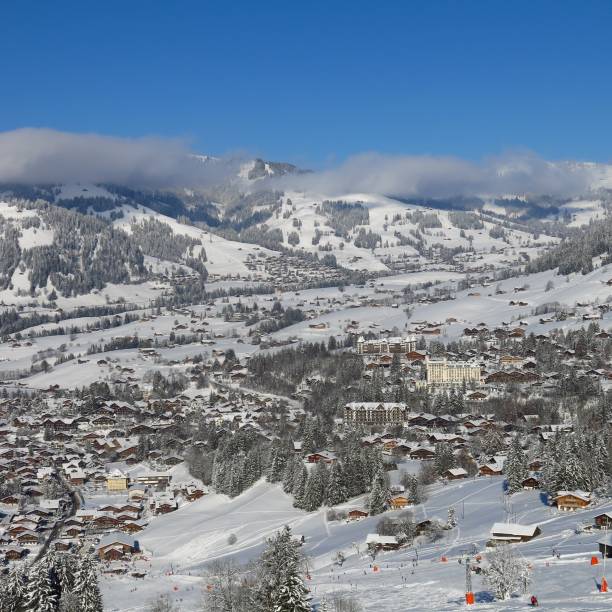 gstaad, famous village and holiday resort in switzerland. winter day. - bernese oberland gstaad winter snow imagens e fotografias de stock