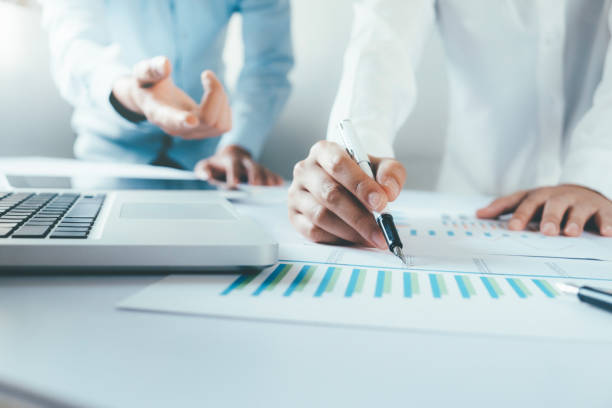 istock Investor working new startup project. Finance meeting. 869405292