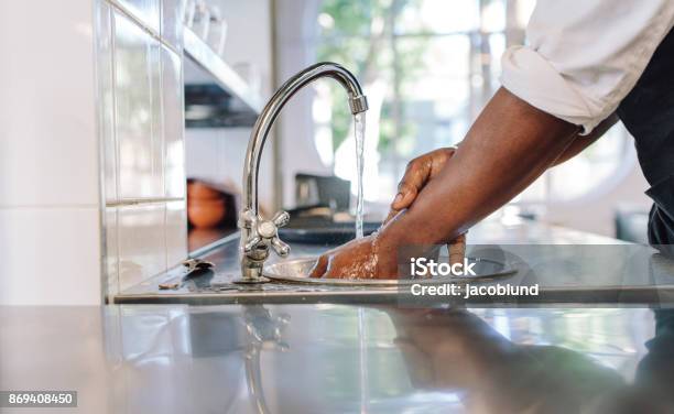 Chef Washing His Hands In Commercial Kitchen Stock Photo - Download Image Now - Washing Hands, Hygiene, Kitchen
