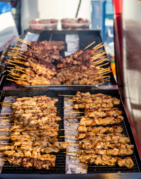 istock Chicken and Beef Kabobs on Grill 869412278