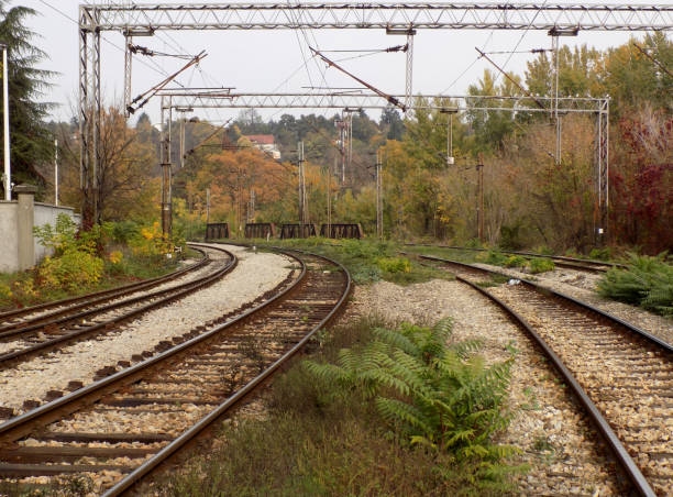 istock railroad junction in the autumn landscape 869413368