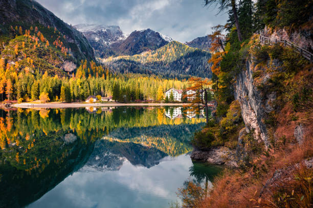 istock Beautiful morning on Braies Lake. 869415036
