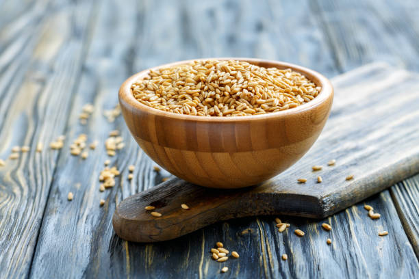 istock Whole grain oats in a wooden bowl. 869415608