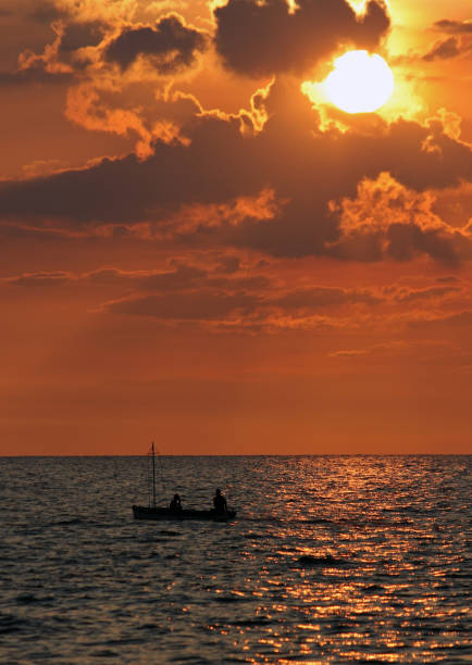 istock Fishing boat during a sunset on Cuba 869419318