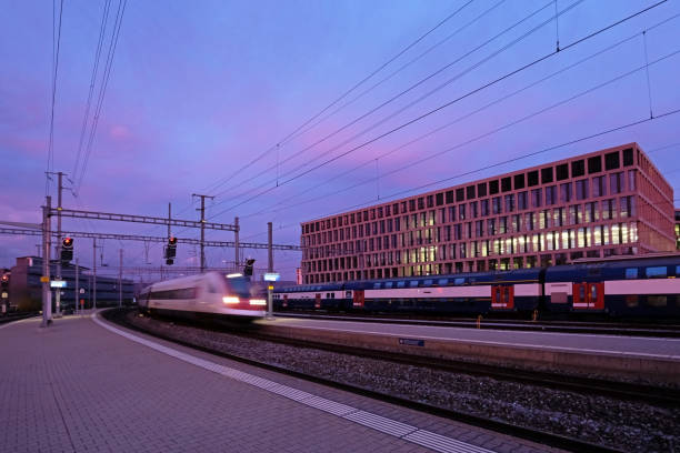 istock Train railway station Brugg with modern University of Applied Sciences, Campus, Brugg-Windisch in the background 869420172