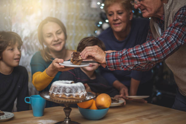 istock Family having Christmas dinner 869424014