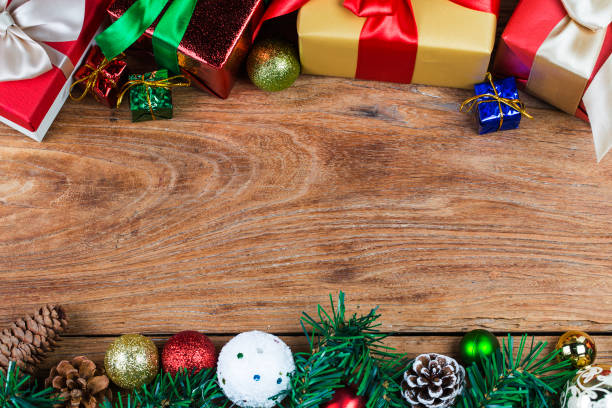 istock Christmas background with a red ornament, gift box, 869427302