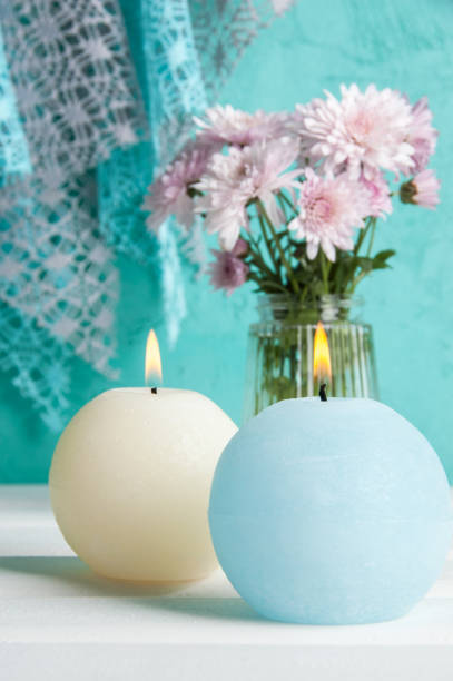istock Blue and cream aroma candles 869430472