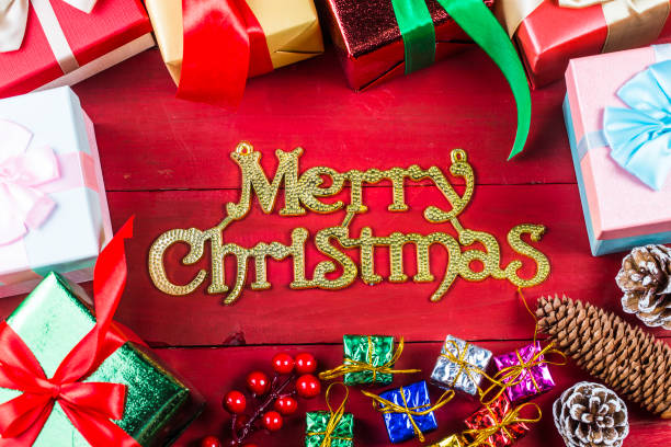 istock Christmas background with a red ornament, gift box, 869434286