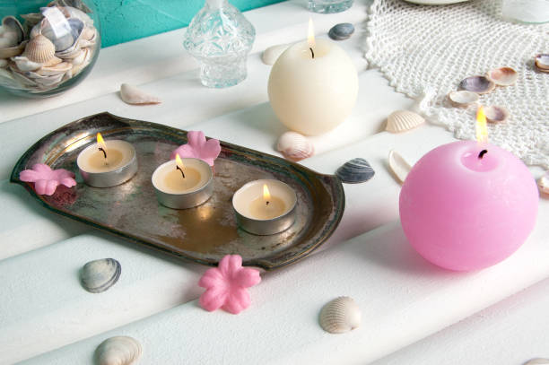istock Pink and cream aroma candles 869436930