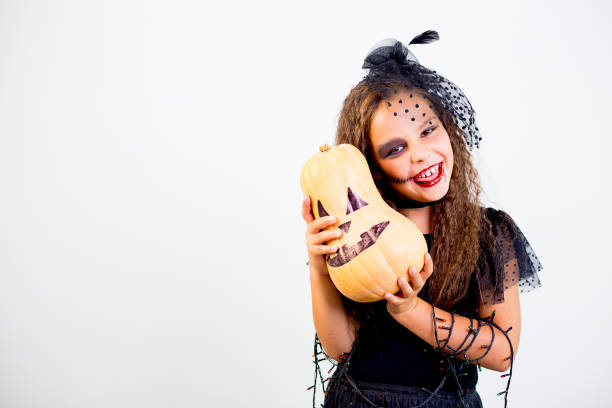istock Girl in witch costume 869436996