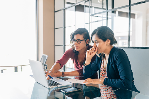 Mexican businesswoman meeting in office