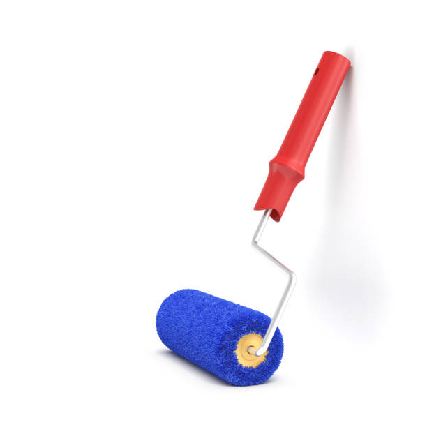 istock 3d rendering of a single paint roller in blue and red color leaning on a white wall. 869440140