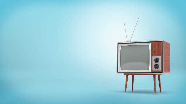 istock 3d rendering a retro TV set with a long antenna and a blank screen stands on a four-legged table on blue background. 869440730
