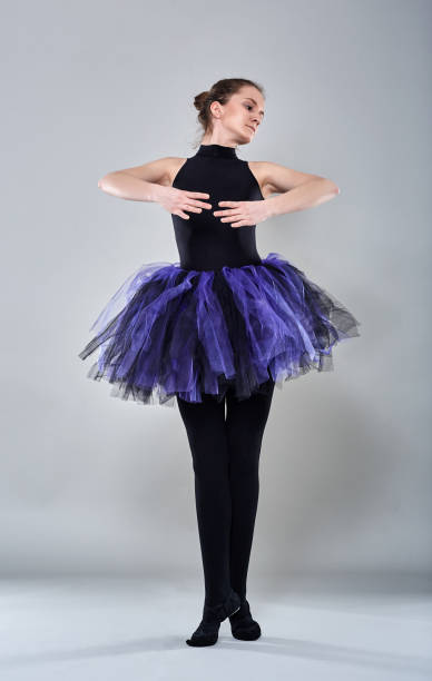 istock Ballerina on gray background 869443910