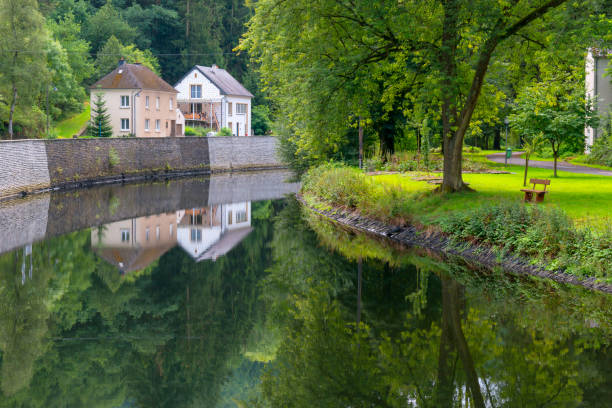Houses along the river Sure in the small village of Esch sur Sure in Luxembourg