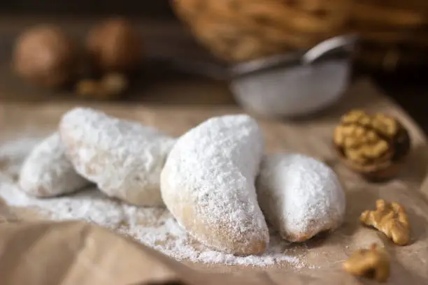 Vanilkipferl - vanilla crescents, traditional Christmas cookies in Germany, Austria, Czech Republic. Homemade cookies. Selective focus.