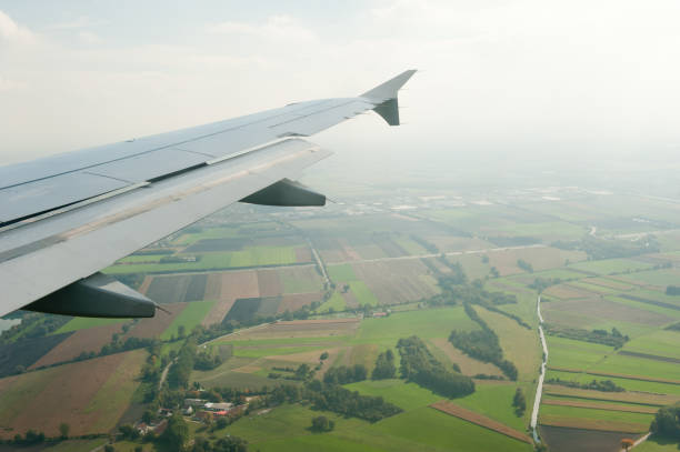istock Plane wing above Franckfurt land 869455342