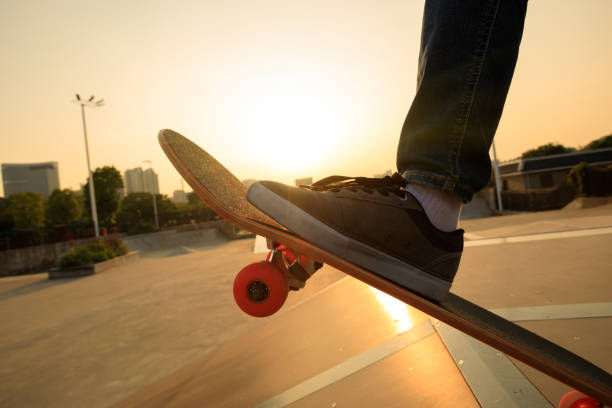 istock skateboarder legs skateboarding on skatepark ramp 869456440