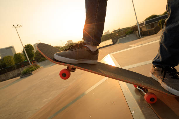 istock skateboarder legs skateboarding on skatepark ramp 869456708