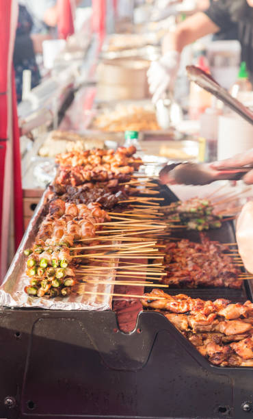istock Kabobs Grilling at Night Market 869462582